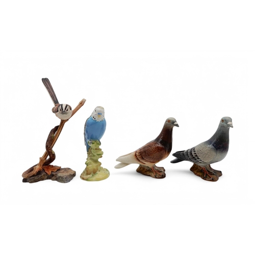 168 - A Beswick grey and a brown pigeon, model no 1383 , a Budgie, no 1217, together with a Hereford Fine ... 