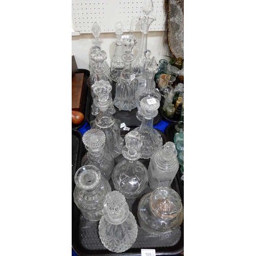 185 - A collection of glass and crystal decanters, varying ages