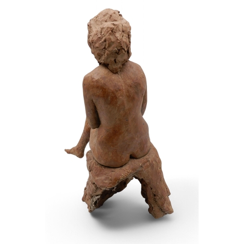 230 - T A Cockburn - A terracotta figure of a seated female nude