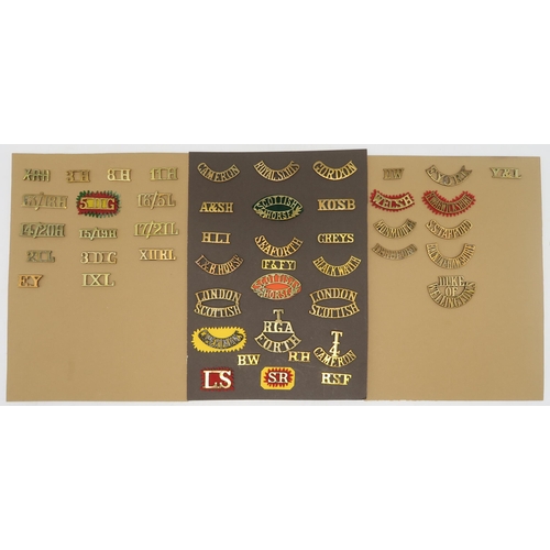 371 - A large collection of military shoulder titles, to include the Duke of Wellington's Regiment, Green ... 