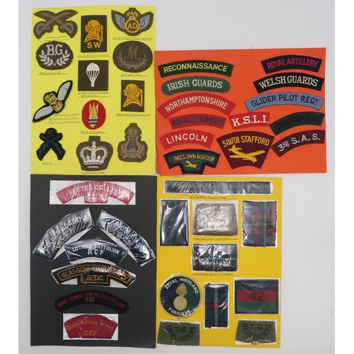 382 - A collection of military embroidered cloth shoulder titles and other cloth uniform insignia, to incl... 