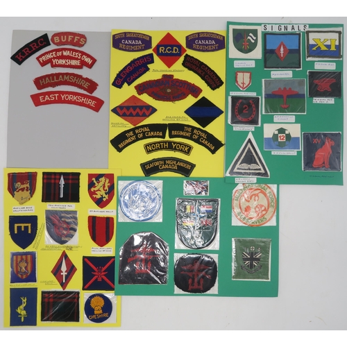 382 - A collection of military embroidered cloth shoulder titles and other cloth uniform insignia, to incl... 