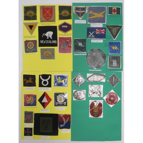 382 - A collection of military embroidered cloth shoulder titles and other cloth uniform insignia, to incl... 