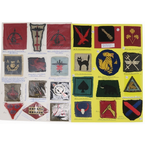 384 - A large collection of military cloth uniform insignia/formation patches, to include the 1st and 6th ... 