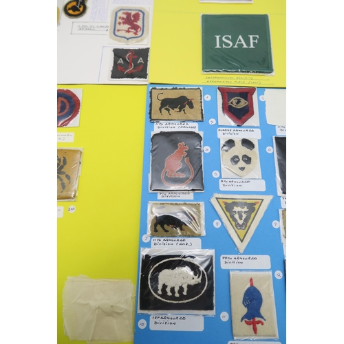 384 - A large collection of military cloth uniform insignia/formation patches, to include the 1st and 6th ... 