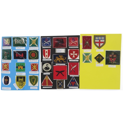 385 - Assorted military cloth uniform insignia/formation patches, to include British Troops in the Low Cou... 