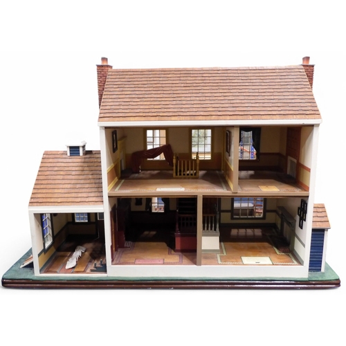 490 - A large and impressive Franklin Mint Hartland Hollow American-style dolls' house, on plinth base, me... 