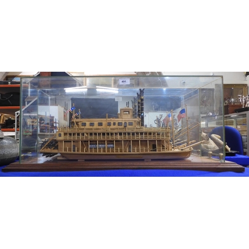 491 - A handmade wooden model of the American paddle steamer King of the Mississippi, housed within a... 