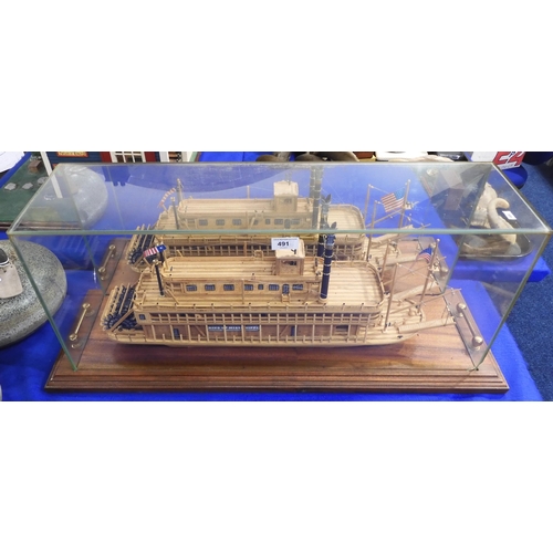 491 - A handmade wooden model of the American paddle steamer King of the Mississippi, housed within a... 