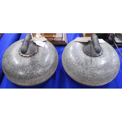 493 - A pair of Edwardian granite curling stones, with one handle engraved 