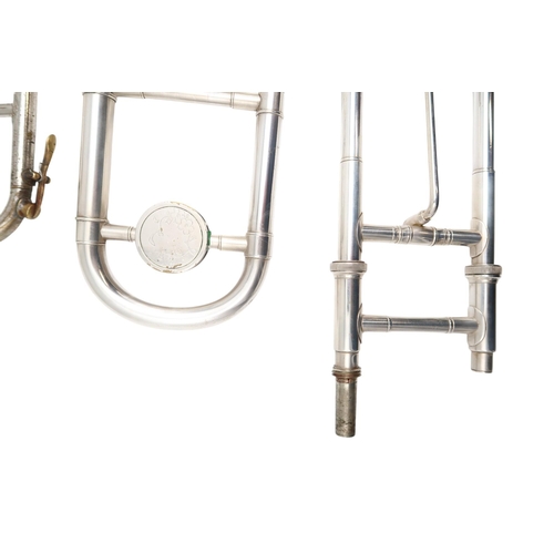 340 - A Union Artistique trombone, no.2150, possibly Swiss, in silver plate, with a soft carry bag. Also a... 