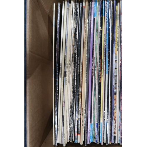 348 - VINYL RECORDS a good box of classic rock LP records with Genesis, John Lennon, Bonnie Raitt, Abba, B... 