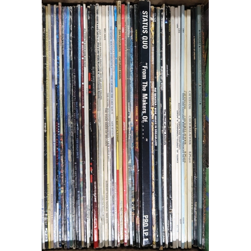 350E - VINYL RECORDS a good box of classic rock LP records with Cat Stevens, Foreigner, Santana, Eric Clapt... 