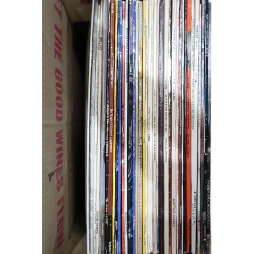 352 - VINYL RECORDS a good box of LP records with Fleetwood Mac, The Beatles, Eagles, Santana, Elton John,... 