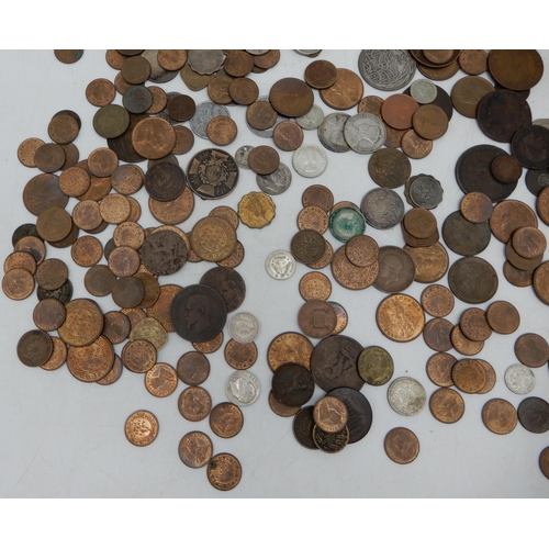 328B - A lot comprising various worldwide coins to include British colonial examples