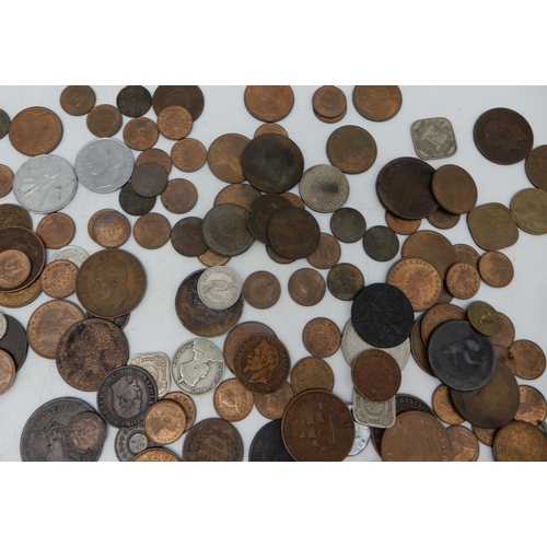 328B - A lot comprising various worldwide coins to include British colonial examples