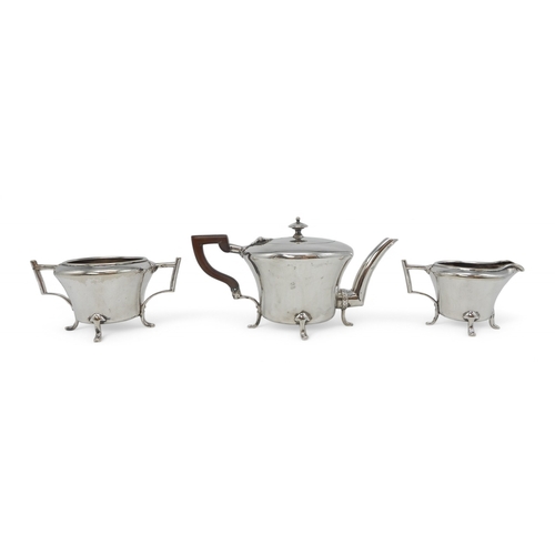 2309 - CHRISTOPHER DRESSER FOR HUKIN & HEATH;A three piece silver-plated tea service, of stylised form,... 