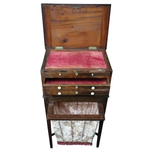 5 - A Victorian walnut sewing work table with hinged top over two lined drawers over fabric hamper drawe... 