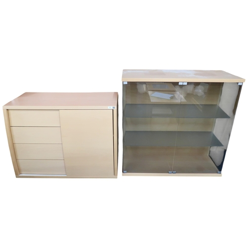 52 - A 20th century Danish Skovby display with glazed two door top on bowed base with four drawers alongs... 