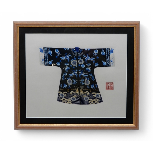 149 - A framed silk work picture of a Chinese robe, two smaller similar examples and a further silk work d... 