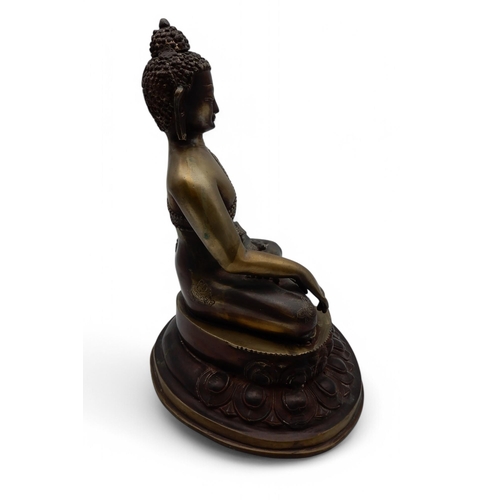 157 - A bronze buddha in seated position