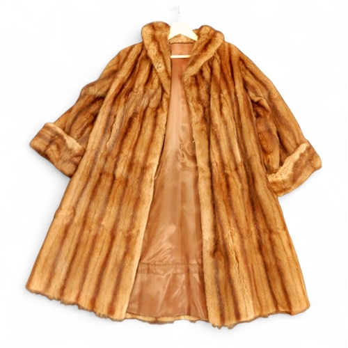 246 - A long brown fur coat