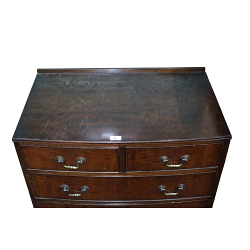 31 - An early 20th century mahogany veneered bow front two over three chest of drawers, 88cm high x 76cm ... 