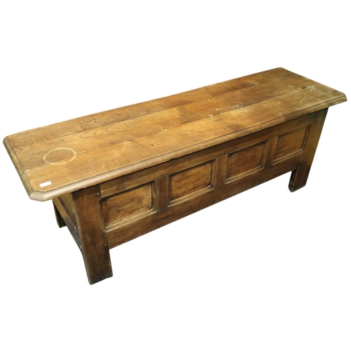 7 - A 19th century oak coffer/dowry chest with three plank top over panelled front and sides on squared ... 