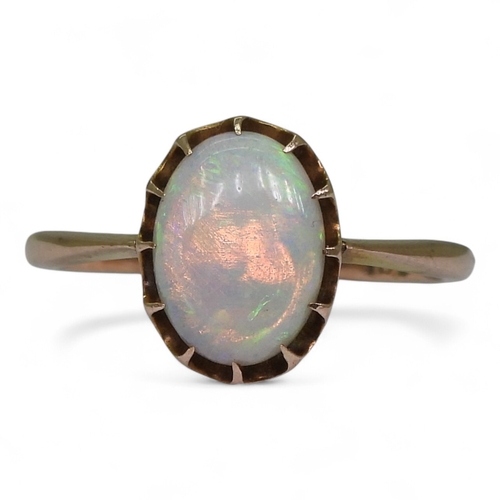 2726 - A 9CT GOLD OPAL RINGin a multi claw setting, stamped 9ct, size K, weight 1.7gms... 