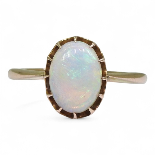 2726 - A 9CT GOLD OPAL RINGin a multi claw setting, stamped 9ct, size K, weight 1.7gms... 