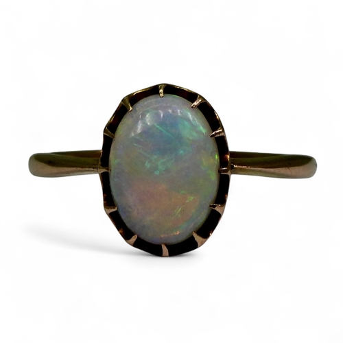 2726 - A 9CT GOLD OPAL RINGin a multi claw setting, stamped 9ct, size K, weight 1.7gms... 