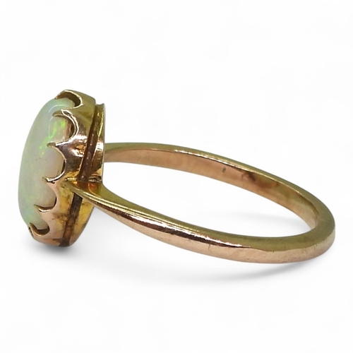 2726 - A 9CT GOLD OPAL RINGin a multi claw setting, stamped 9ct, size K, weight 1.7gms... 