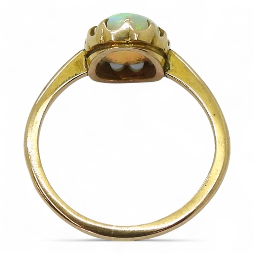 2726 - A 9CT GOLD OPAL RINGin a multi claw setting, stamped 9ct, size K, weight 1.7gms... 