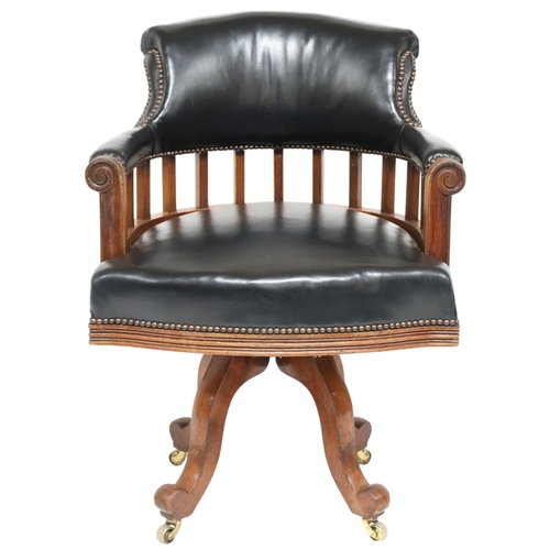 2016 - AN EARLY 20TH CENTURY BEECH FRAMED CAPTAINS STYLE SWIVEL DESK CHAIR&nbsp;with black Rexine upholster... 