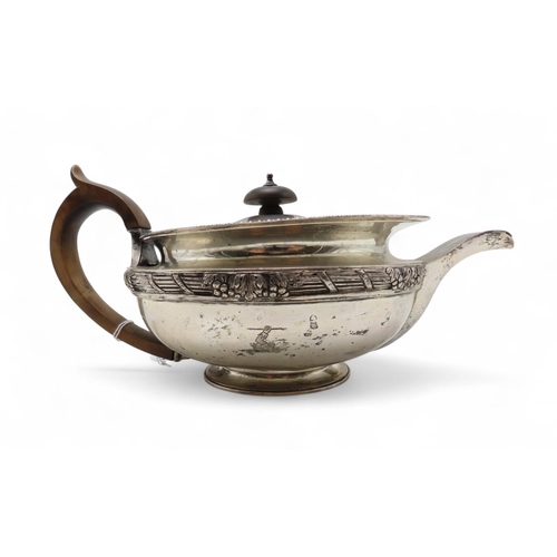 277 - An Edwardian silver teapot, by C S Harris & Sons Ltd, London 1906, of squat baluster form, crest... 