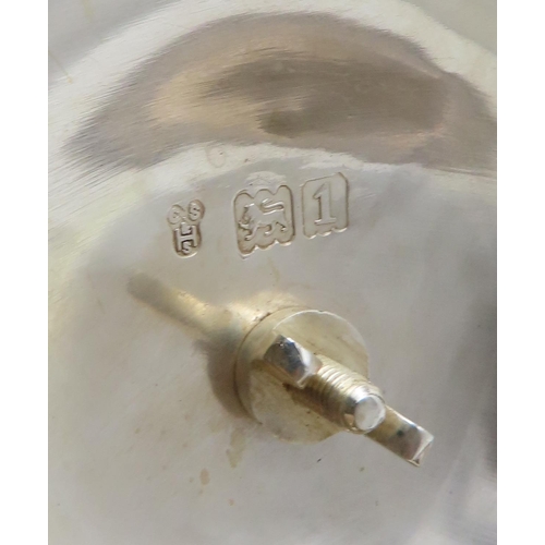 277 - An Edwardian silver teapot, by C S Harris & Sons Ltd, London 1906, of squat baluster form, crest... 