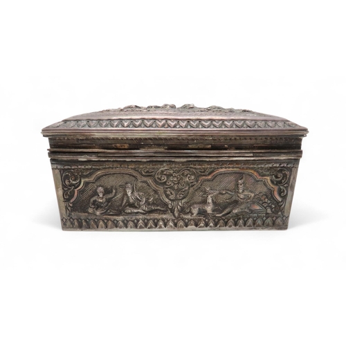 282 - A Burmese silver jewellery box, of rectangular form, decorated in repousse with figures within lands... 