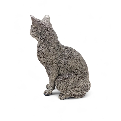 283 - A silver Country Artist's model of a cat, with enamel eyes, 9.5cm