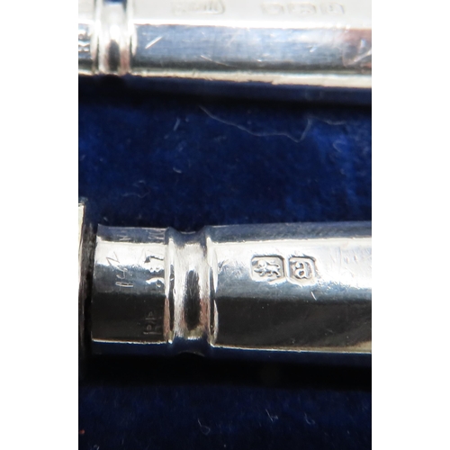 289 - A set of silver-handled butter knives, R F Mosley & Co, Sheffield 1900, and another set by John ... 