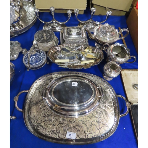 301 - A collection of EPNS including a three piece tea service tea service, trays, entree dishes, a pair o... 