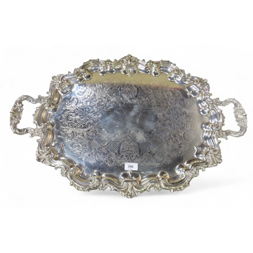 306 - A large and impressive Victorian EPNS twin-handled serving tray, with a rocaille scrollwork border, ... 