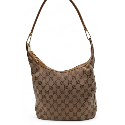 6119 - Gucci - A leather cross body bag, a leather shoulder bag with stitched logo to front, a canvas body ... 