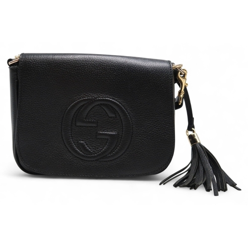 6119 - Gucci - A leather cross body bag, a leather shoulder bag with stitched logo to front, a canvas body ... 