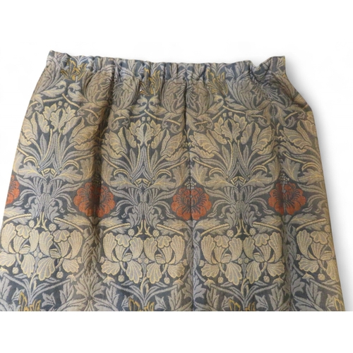 2188 - WILLIAM MORRIS (1834-1896) A PAIR OF TULIP AND ROSE WOVEN WOOL CURTAINS with dark blue panels to eit... 