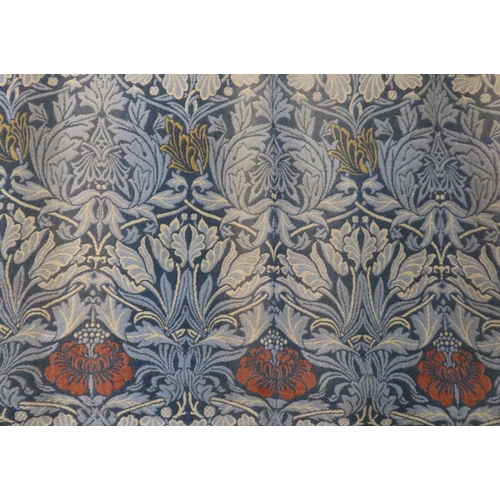 2188 - WILLIAM MORRIS (1834-1896) A PAIR OF TULIP AND ROSE WOVEN WOOL CURTAINS with dark blue panels to eit... 