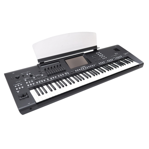 2604 - A YAMAHA GENOS2 76-KEY ARRANGER WORKSTATION KEYBOARD with an instruction manual and CD, and a Yamaha... 