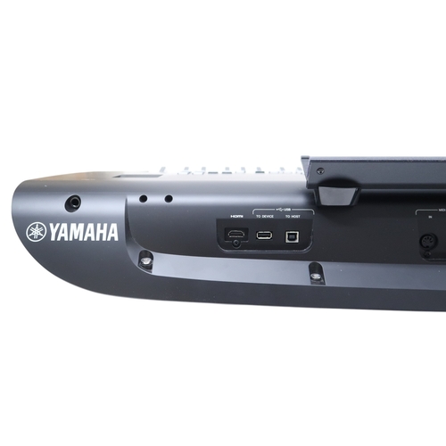 2604 - A YAMAHA GENOS2 76-KEY ARRANGER WORKSTATION KEYBOARD with an instruction manual and CD, and a Yamaha... 