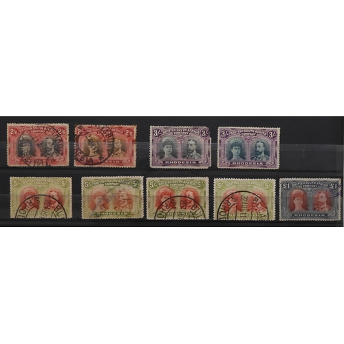 7134 - RHODESIA 1910-1913 on stock book pages of George V and Queen Mary with values to £1 mainly used but ... 