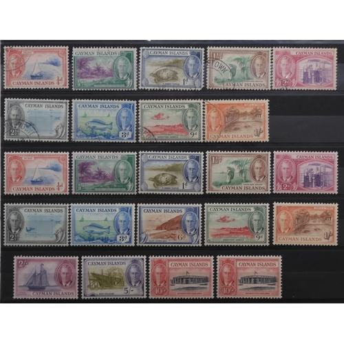 7152 - CAYMAN ISLANDS a collection on 5 stock book pages to include 1900 ½d and 1d used and mint with a blo... 