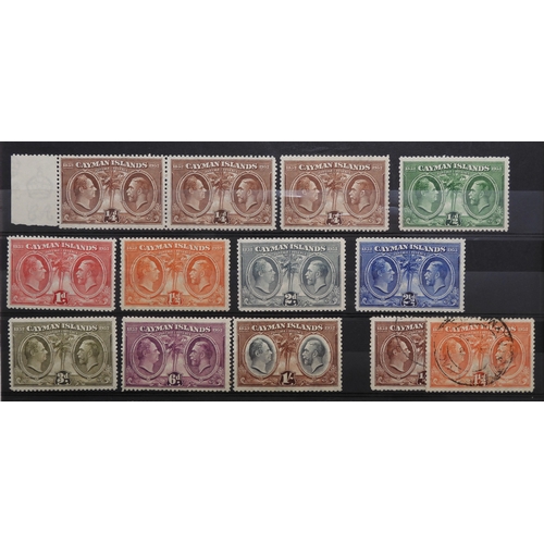 7152 - CAYMAN ISLANDS a collection on 5 stock book pages to include 1900 ½d and 1d used and mint with a blo... 